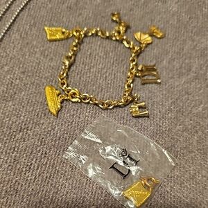 Charming Gold Bracelet with Unique Charms
